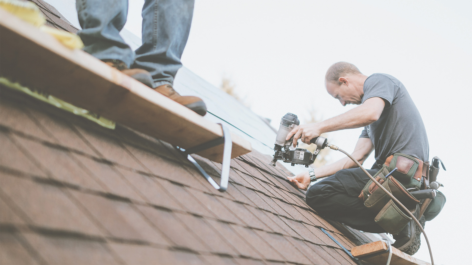 Man working on roof